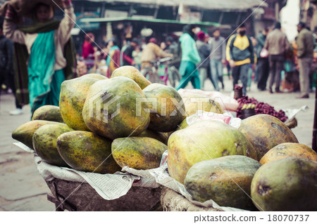 The street vendor sels his fruits and vegetables  18070737
