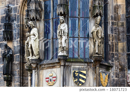 Closeup of Prague Town Hall window with sculptures 18071723
