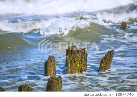 Baltic Sea with groynes and surf Baltic Sea with groynes and surf 18074740