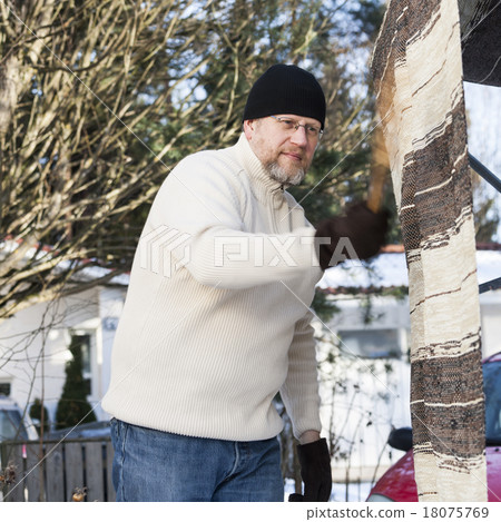 Man doing household chores Man doing household chores 18075769