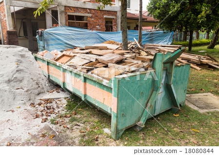 Construction rubbish bin with loads at site Construction rubbish bin with loads at site 18080844