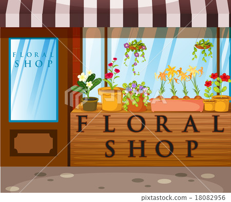 Floral shop with beautiful flowers in front 18082956