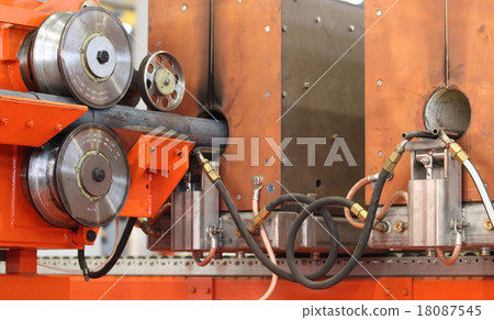moving stream of metal workpieces 18087545