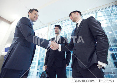 Business people shaking hands Business people shaking hands 18088293