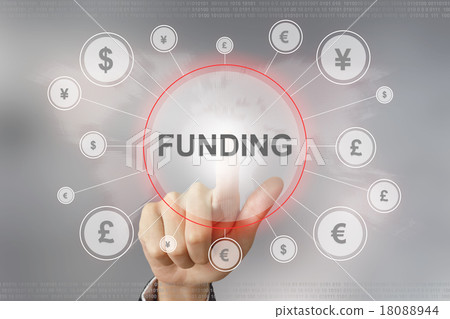 business hand pushing funding button 18088944