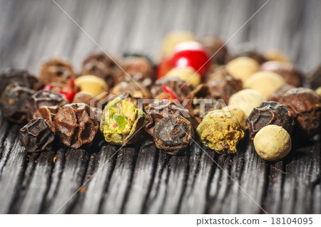pepper corns on a wooden board pepper corns on a wooden board 18104095