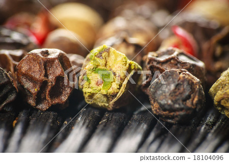 pepper corns on a wooden board pepper corns on a wooden board 18104096