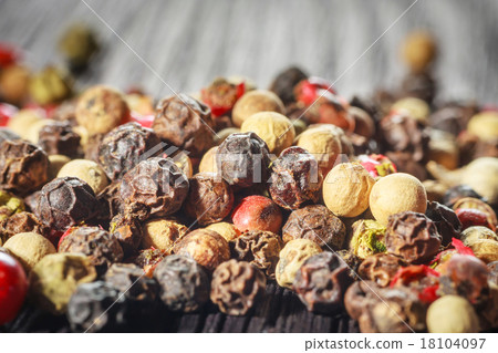 pepper corns on a wooden board pepper corns on a wooden board 18104097