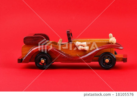 A toy car made of wood 18105576