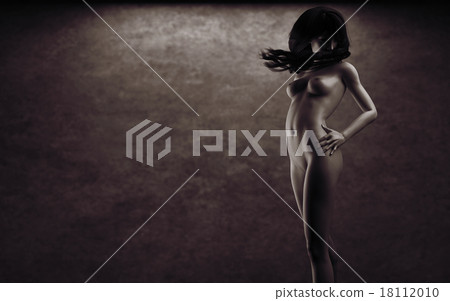 Beautiful naked young woman in the dark studio 18112010