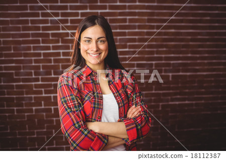 Beautiful hipster smiling at camera Beautiful hipster smiling at camera 18112387