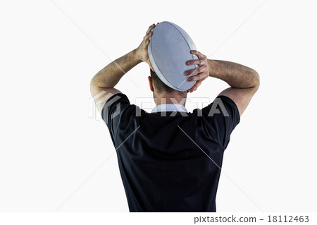 Rugby player about to throw a rugby ball 18112463