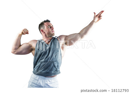 Handsome bodybuilder posing with arms up Handsome bodybuilder posing with arms up 18112793