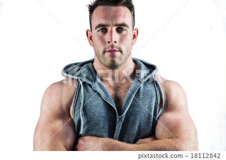 Handsome bodybuilder with arms crossed 18112842