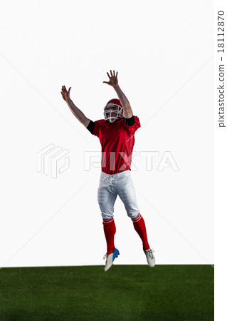American football player trying to catch football American football player trying to catch football 18112870