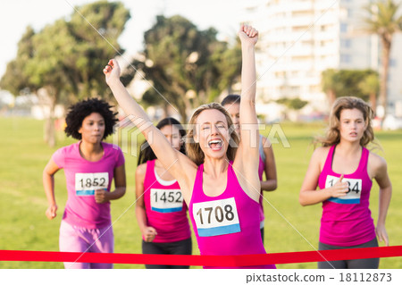 Cheering blonde winning breast cancer marathon Cheering blonde winning breast cancer marathon 18112873