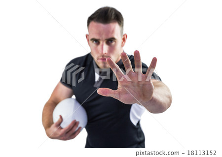 Tough rugby player looking at camera 18113152