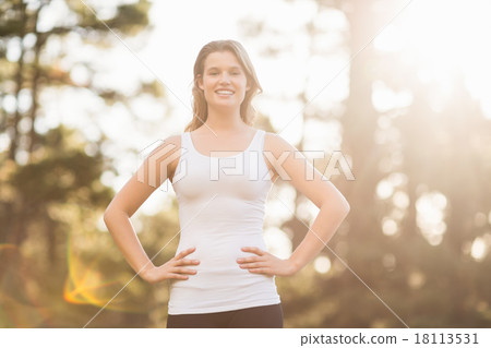 Young happy jogger looking at camera 18113531