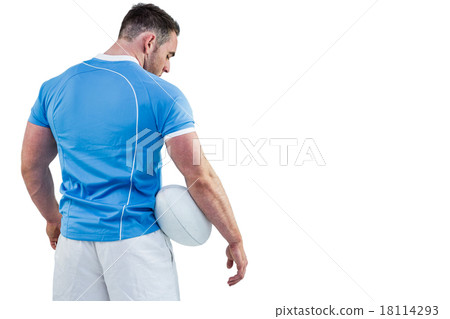 Rugby player standing with ball 18114293