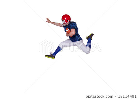 American football player jumping with the ball American football player jumping with the ball 18114491