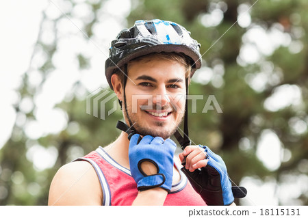 Handsome young biker looking at camera 18115131