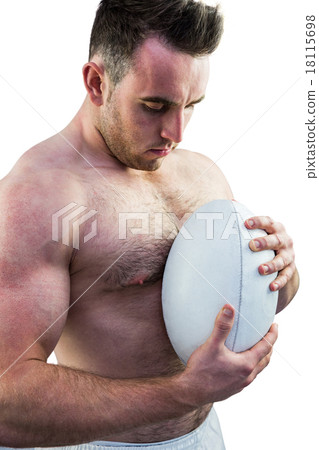 Shirtless rugby player holding ball Shirtless rugby player holding ball 18115698
