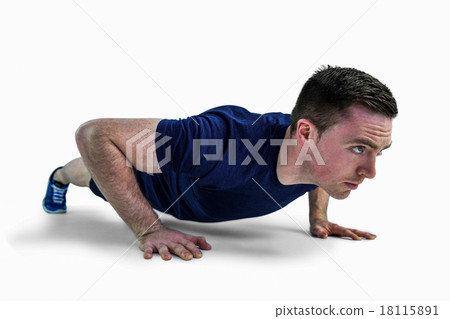 A fit man doing push ups A fit man doing push ups 18115891