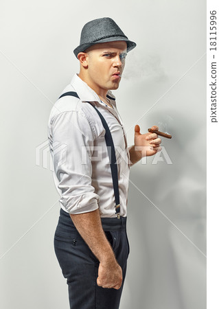 Stylish man smoking cigar 18115996