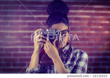 Young hipster taking a picture 18116503