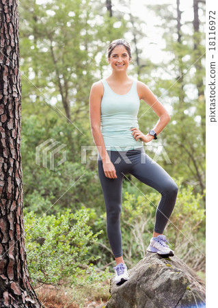Happy jogger looking at camera Happy jogger looking at camera 18116972