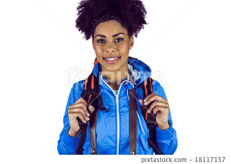 Close up view of a young woman with camera and backpack 18117157
