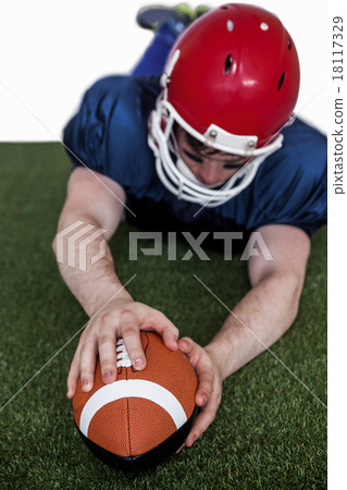 American football player scoring a touchdown 18117329