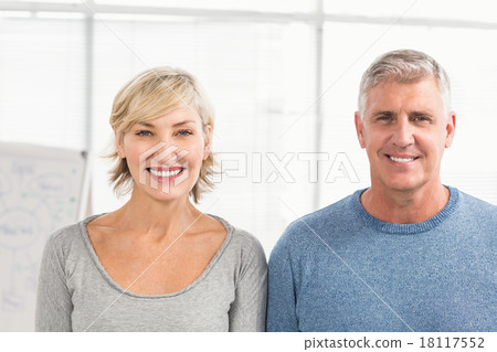 Smiling business colleagues looking at the camera 18117552