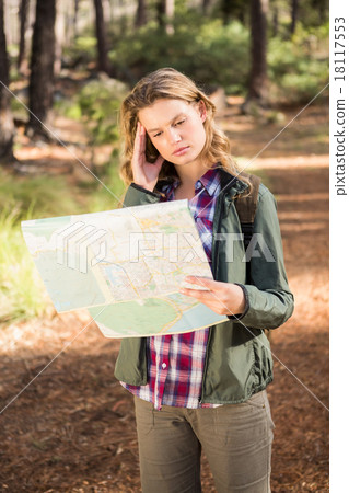 Pretty blonde hiker reading map Pretty blonde hiker reading map 18117553