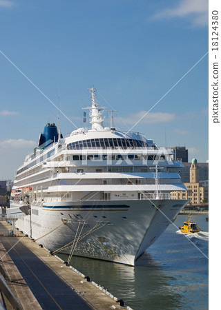 Asuka Ⅱ which bordered to Yokohama port pier, the whole shape seen from the bow, the background is Queen's tower 18124380
