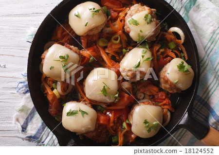 meatballs with cheese in the pan closeup top view 18124552