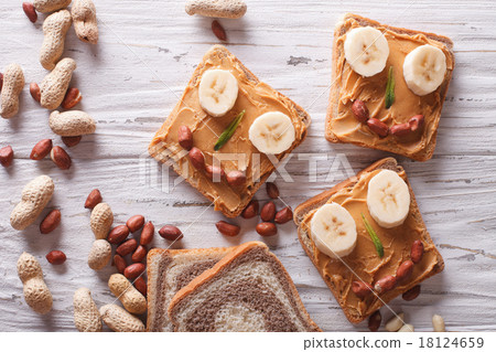 Funny sandwiches with peanut butter top view 18124659