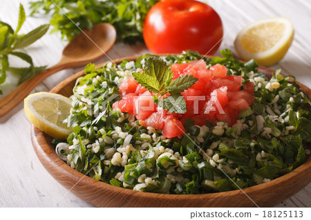 Vegetarian salad Tabbouleh closeup and ingredients 18125113