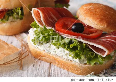 Sandwich with prosciutto closeup horizontal 18125196