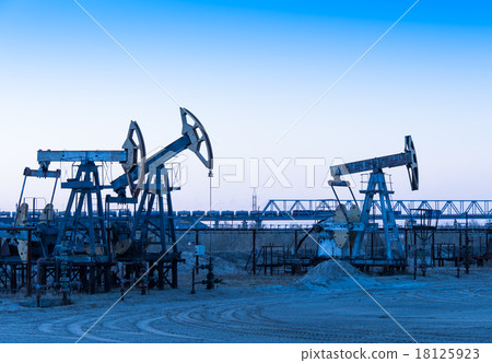 Oil pumps on a oil field. 18125923