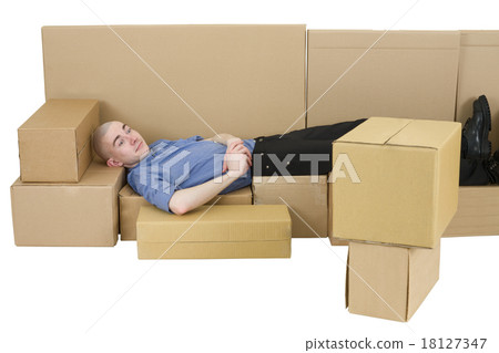 Man with carton TVset and sofa 18127347