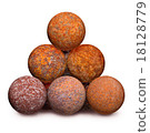 Ten rusty iron cannon balls on white background 18128779