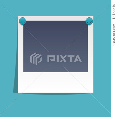 Photo frame on wall with blue pins on blue 18128810