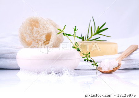 Herbal spa soap bar on white bath towel . 18129979