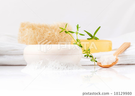 Herbal spa soap bar on white bath towel . Herbal spa soap bar on white bath towel . 18129980
