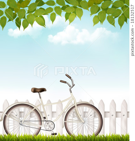 Bicycle in front of a white fence with leaves. Bicycle in front of a white fence with leaves. 18132517