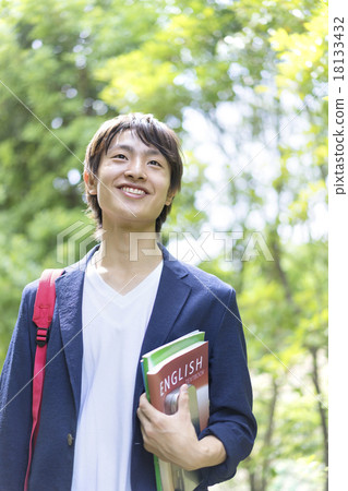 Young men with textbooks Young men with textbooks 18133432