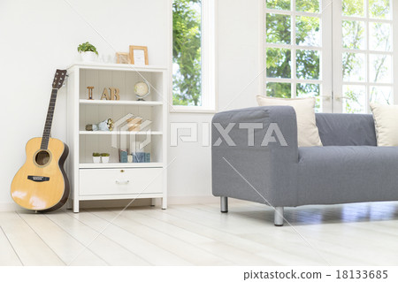 Room with decorative shelf and sofa 18133685