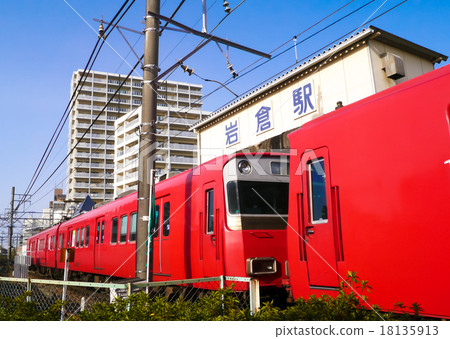 Trains stopping in the west side of Iwakura station 18135913