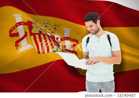 Composite image of student using laptop 18140487